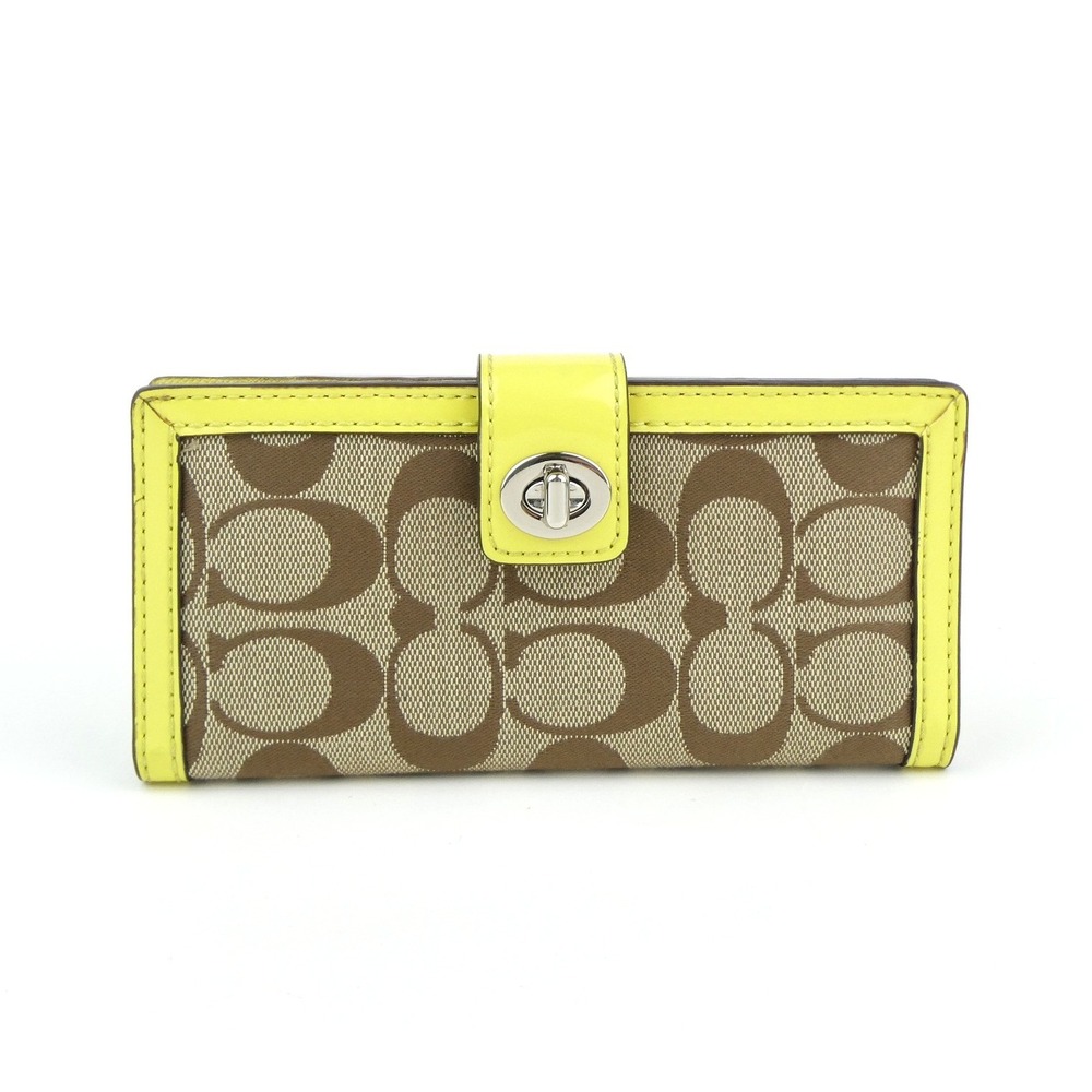 Coach Signature Khaki Brown Yellow Turnlock Bifold Wallet
